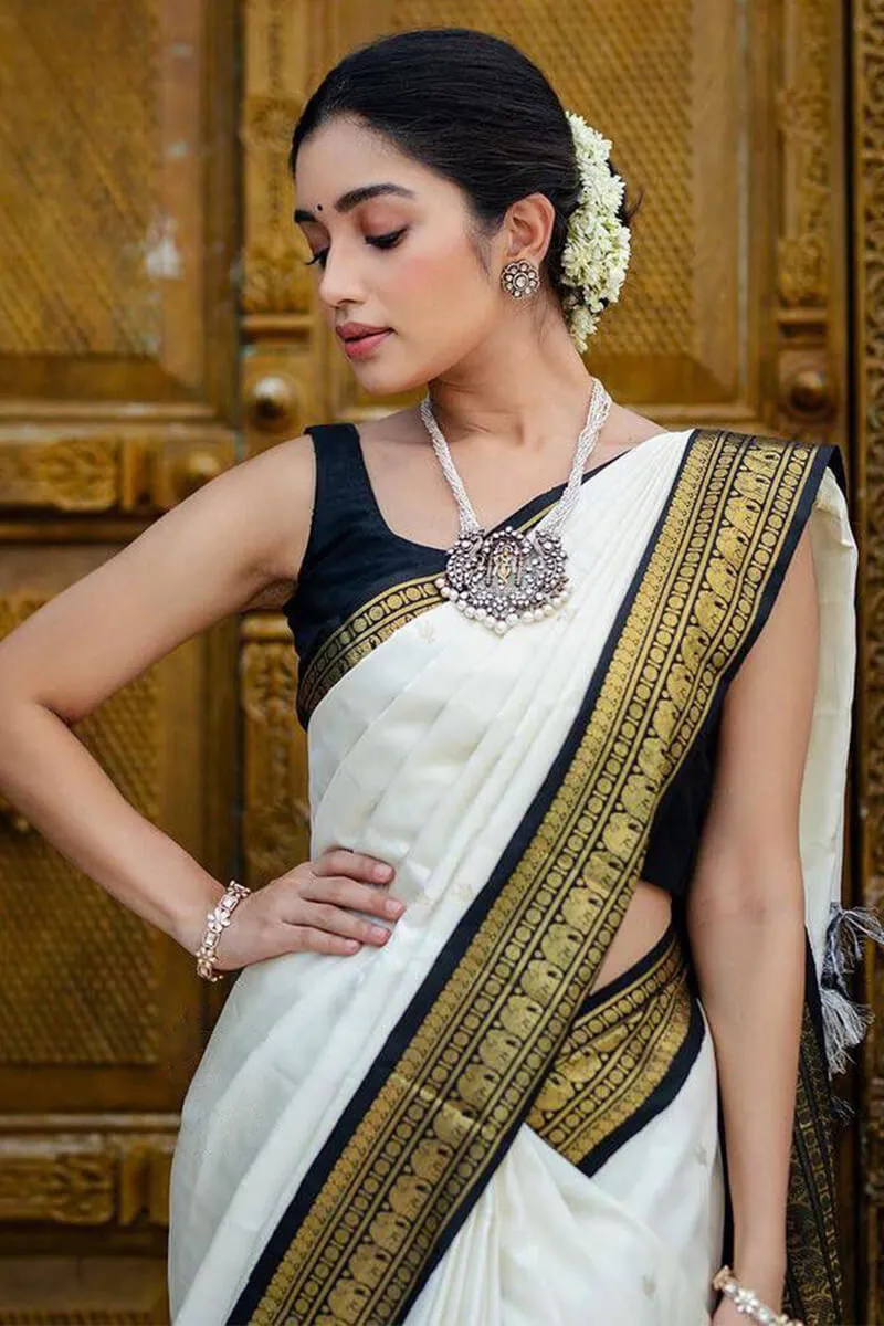 Denouement Off White Soft Silk Saree With Confounding Blouse Piece