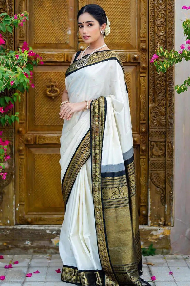 Denouement Off White Soft Silk Saree With Confounding Blouse Piece